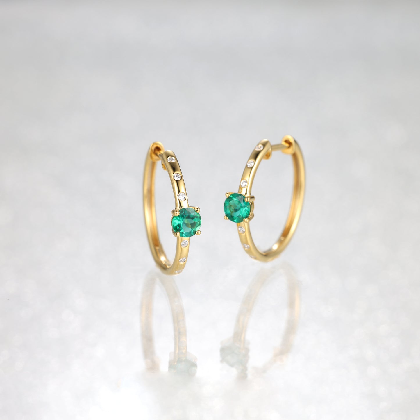 Tiny Round Emerald Huggie Earrings