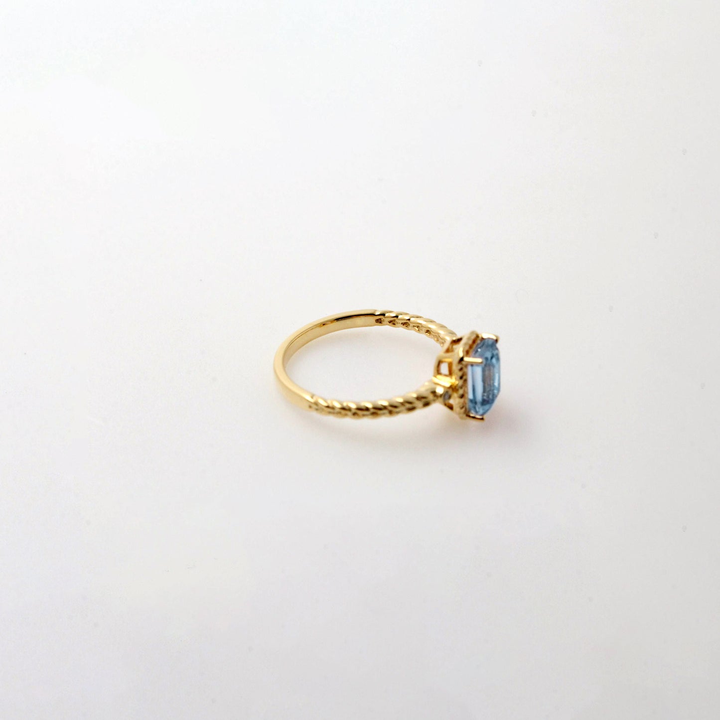 Emerald Cut Swiss Blue Topaz Twist Ring