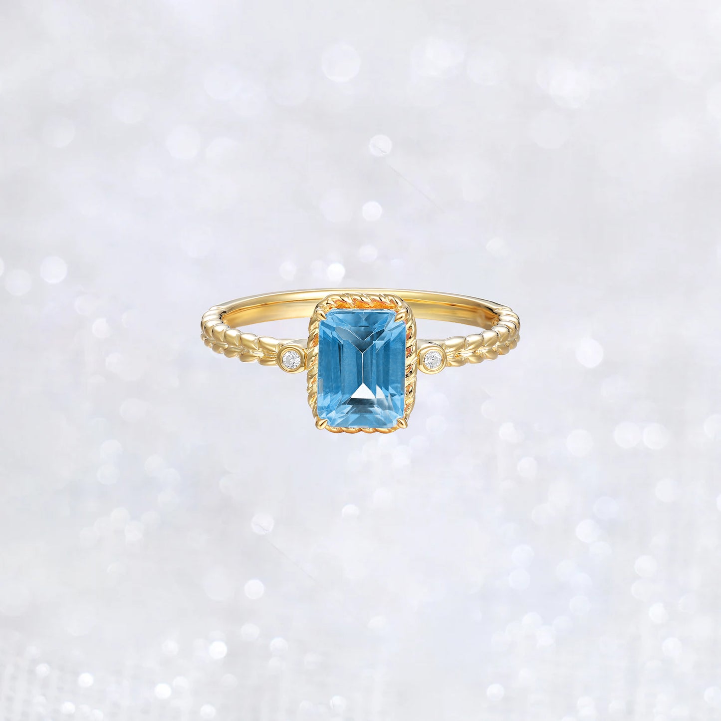 Emerald Cut Swiss Blue Topaz Twist Ring