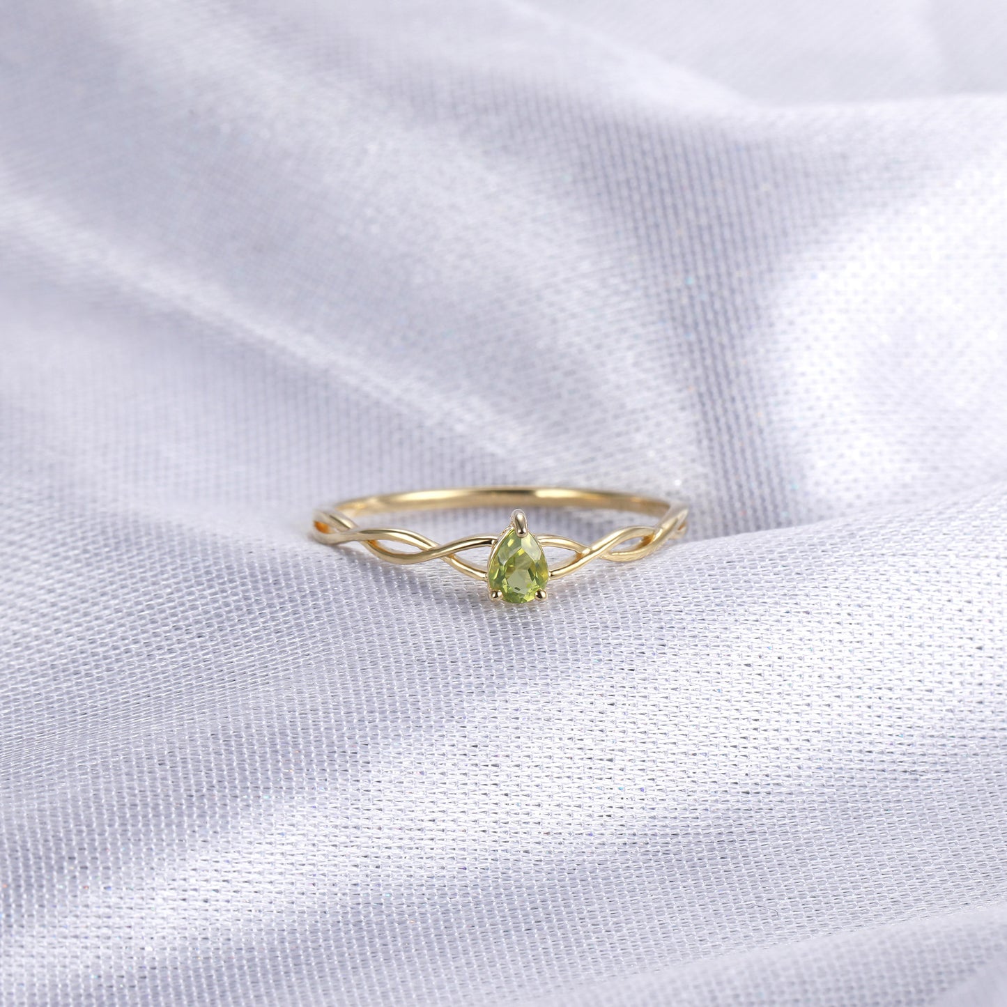 Pear Peridot Solitaire Ring
