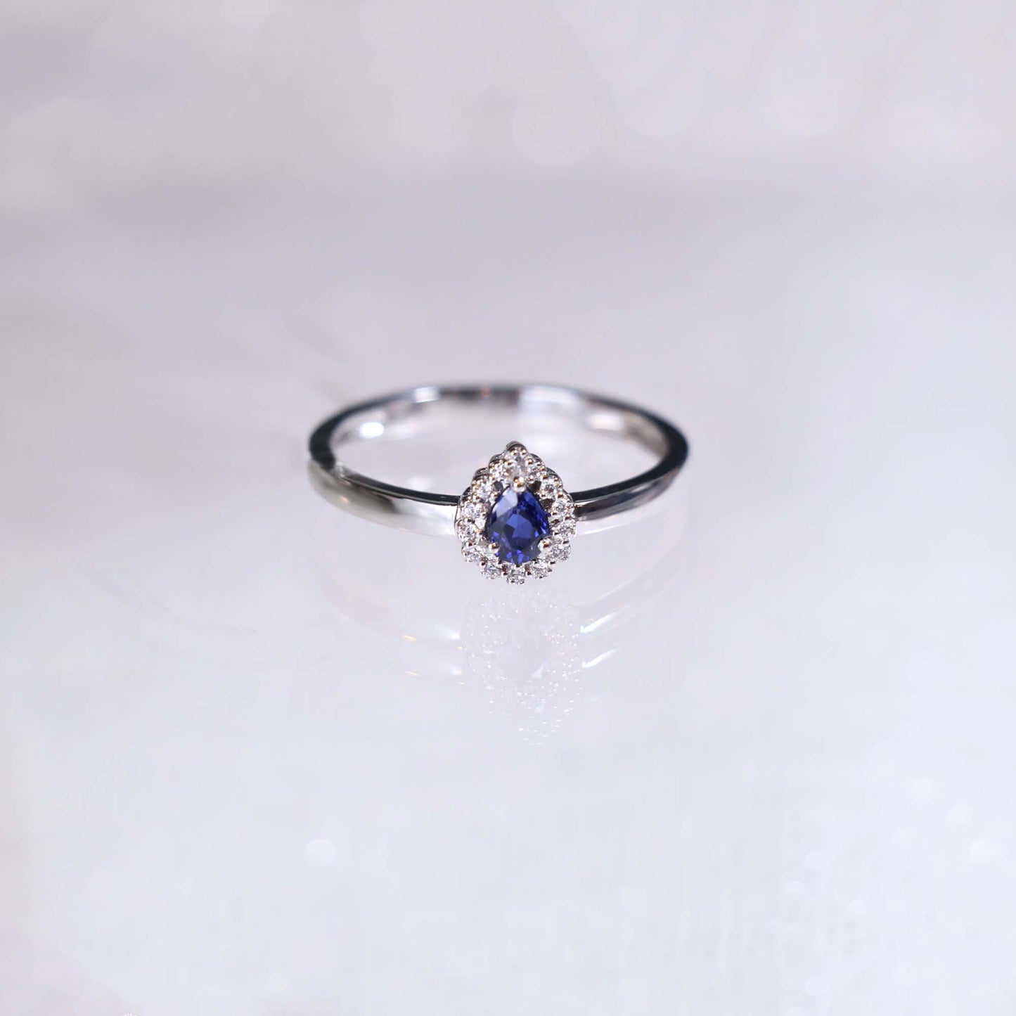 Pear Sapphire Halo Diamond Ring