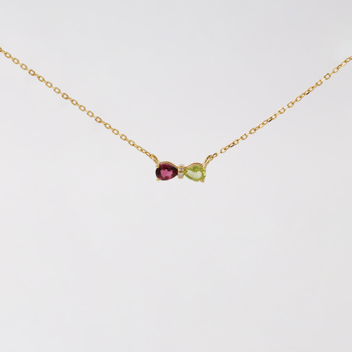 Rhodolite Garnet Peridot Diamond Bowtie Necklace