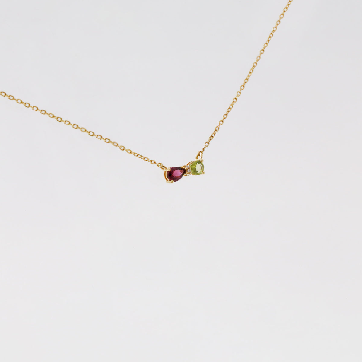 Rhodolite Garnet Peridot Diamond Bowtie Necklace