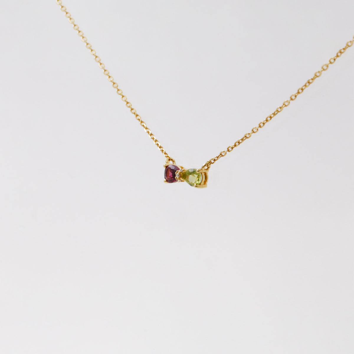 Rhodolite Garnet Peridot Diamond Bowtie Necklace