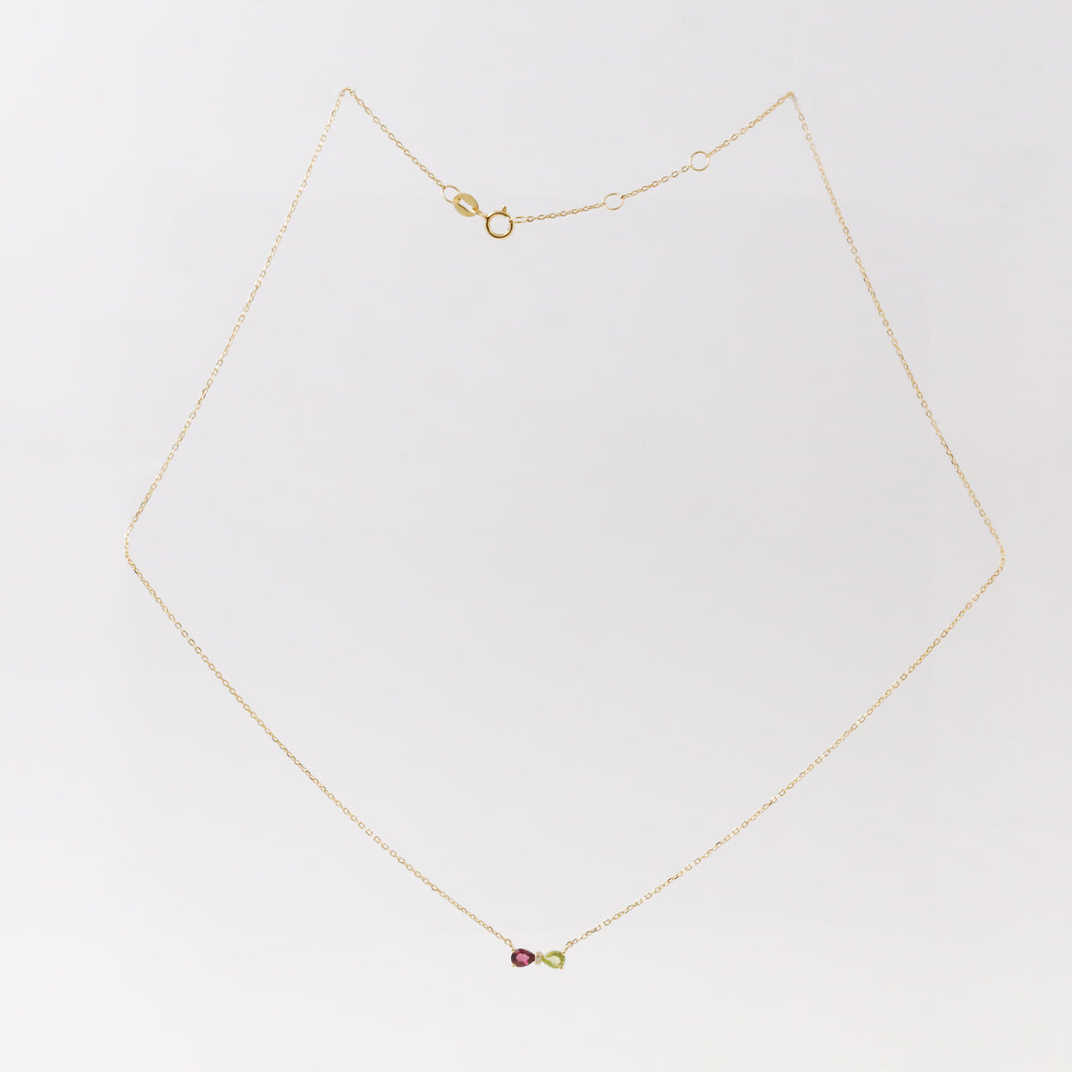 Rhodolite Garnet Peridot Diamond Bowtie Necklace