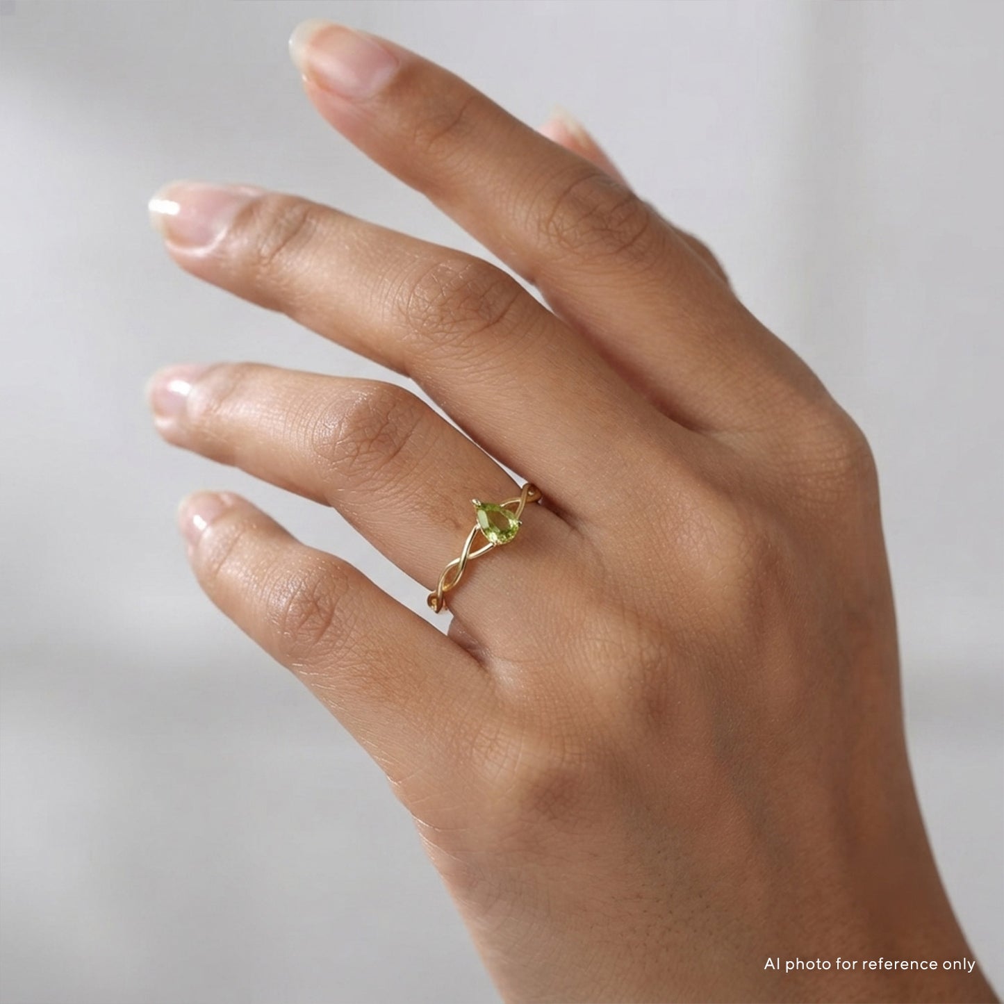 Pear Peridot Solitaire Ring
