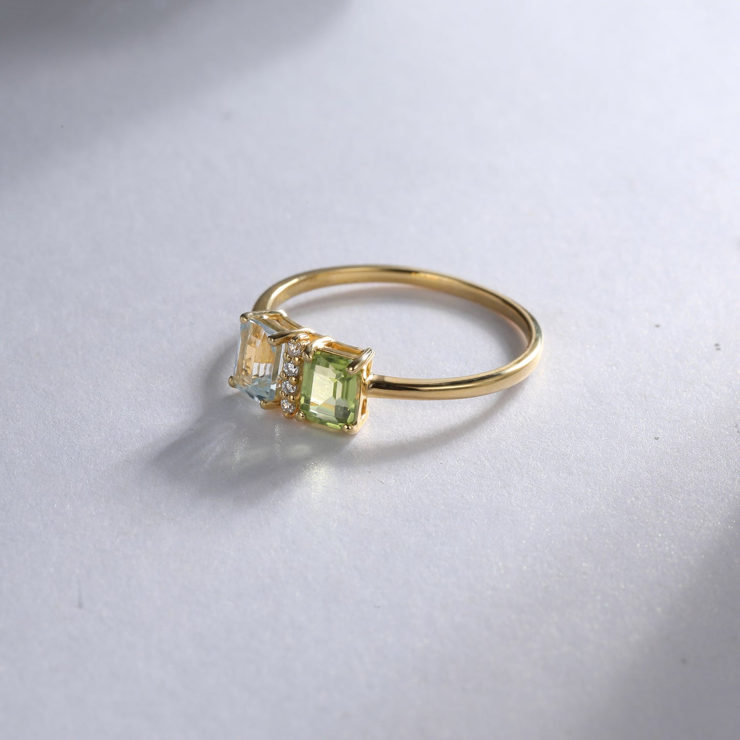 Emerald Cut Blue Topaz Peridot Ring