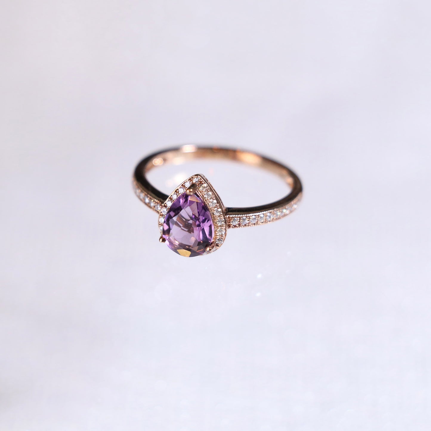 Pear Amethyst Halo Diamond Ring