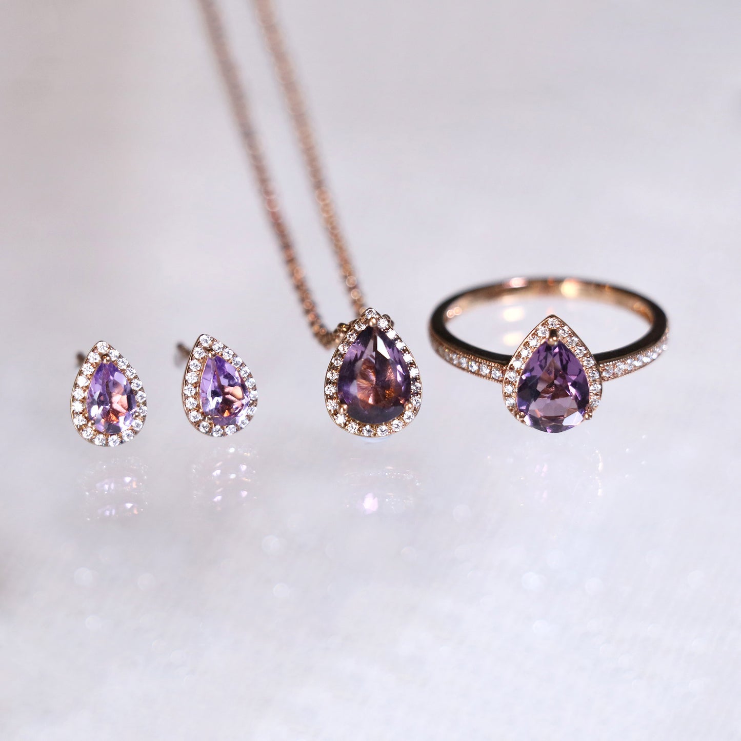 Pear Amethyst Halo Diamond Ring