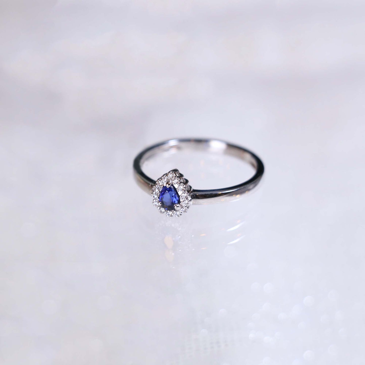 Pear Sapphire Halo Diamond Ring